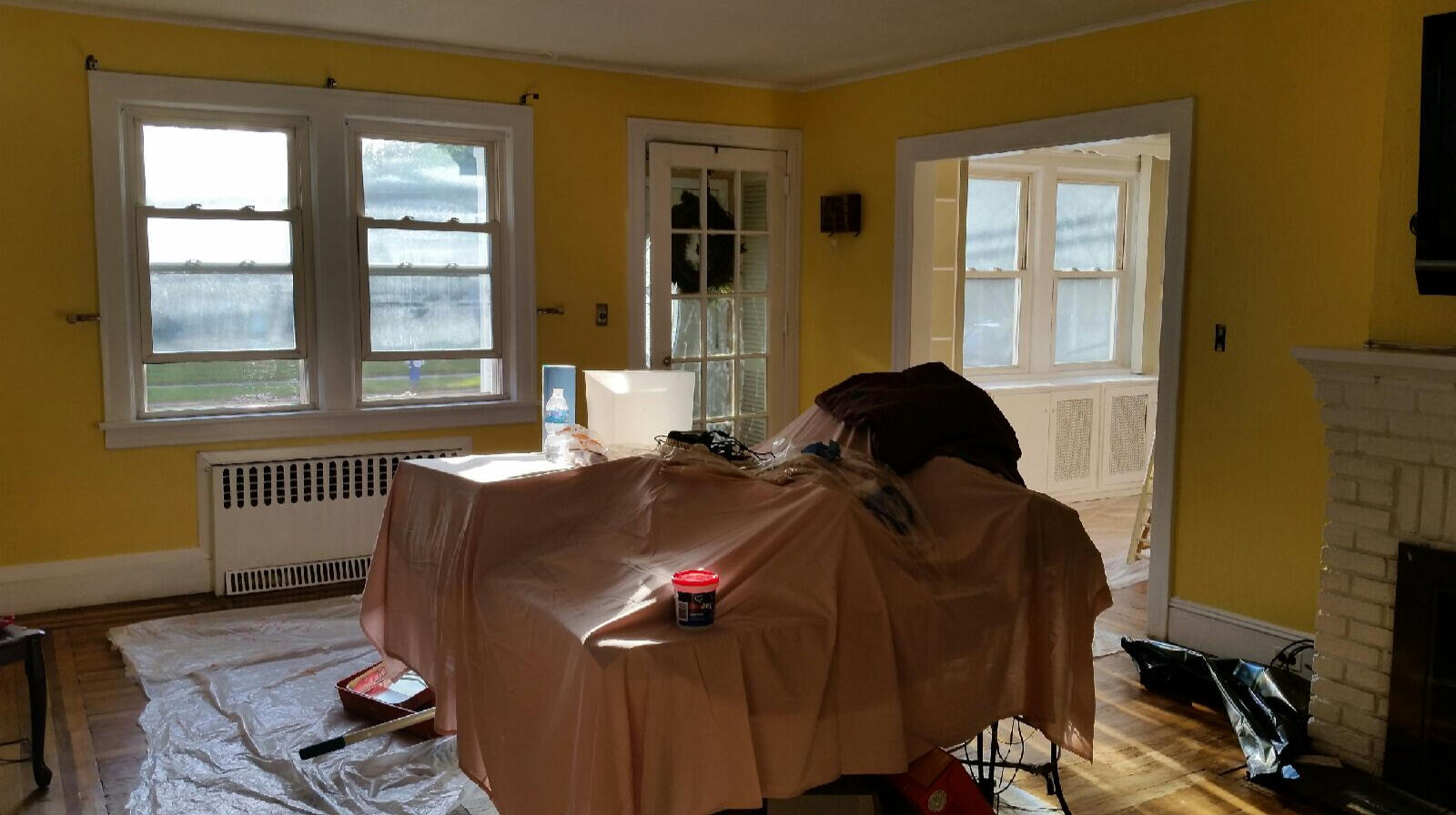 Den Room (AFTER) with Yellow walls & White Boarders